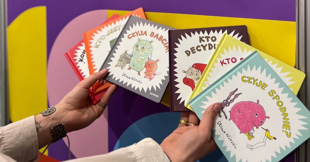 sześć książek Stiny Wirsen Wydawnictwa Zakamarki, trzymanych w dwóch dłoniach